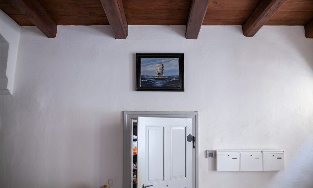 entrance area with wood-beam ceiling